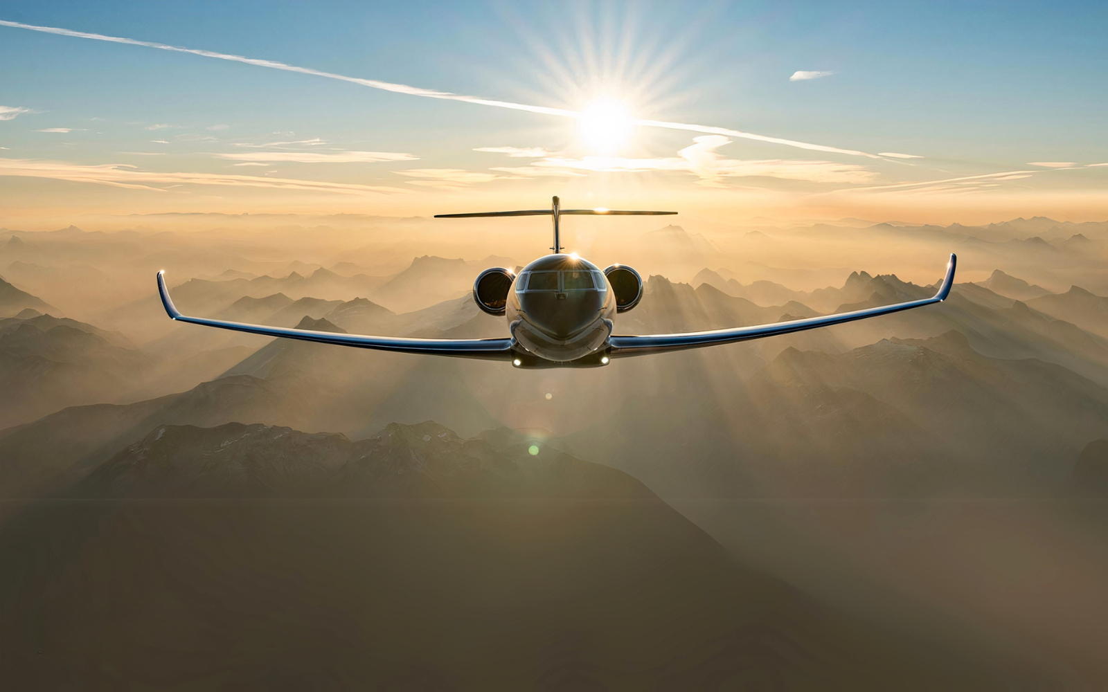 Gulfstream G700 Flying Above Mountains at Sunset